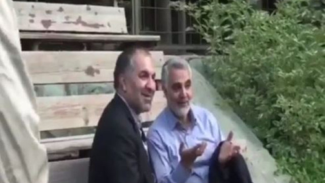 martyr Hajj Qasem Soleimani on the sidelines of the football field, watching his Kermani comrades play